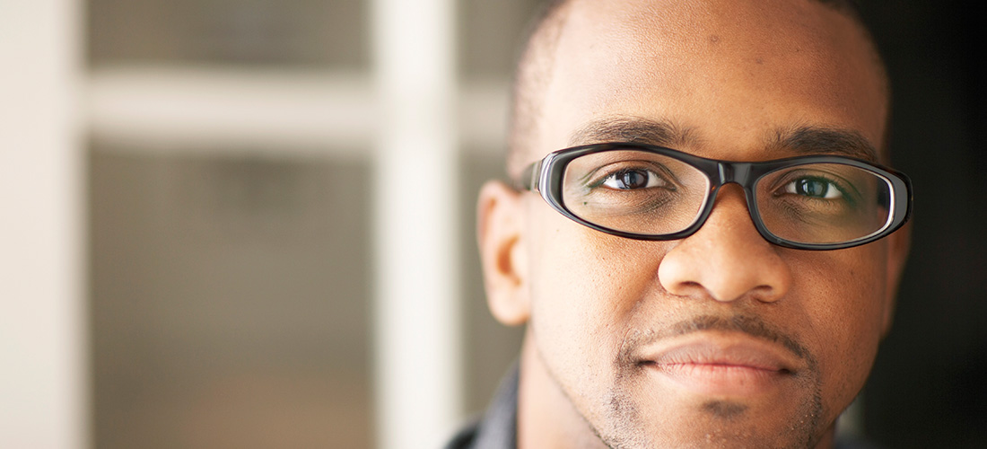 Close Up Of Man With Glasses