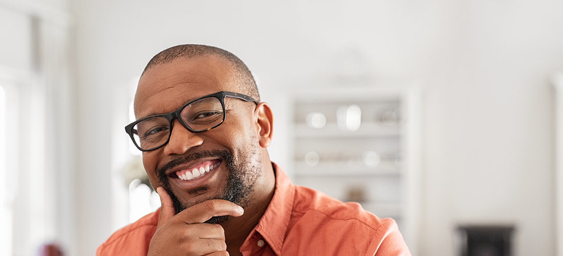 Man With Orange Shirt And Glasses